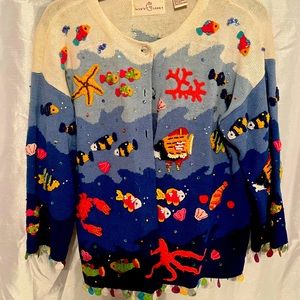 Women’s embellished sweater. Jane’s closet from stein mart. Adult small.